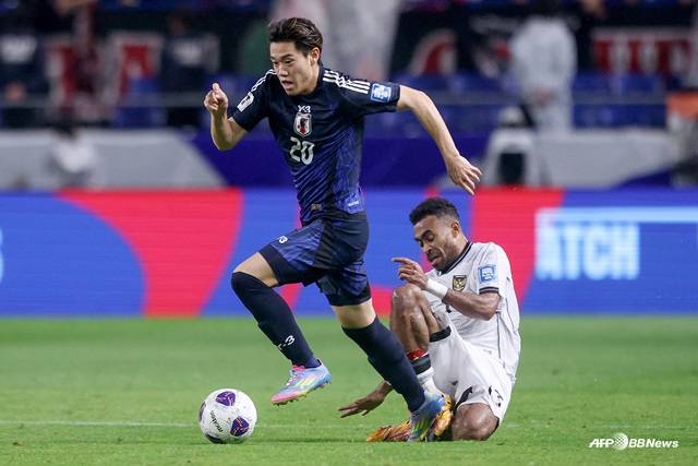 인도네시아(흰색 유니폼)와 일본 경기. /AFPBBNews=뉴스1