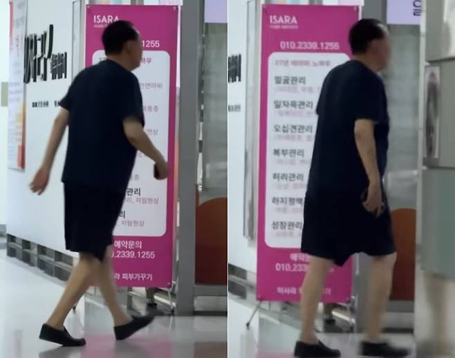 12일 경찰 소환에 응하지 않은 윤석열 전 대통령이 사저인 서울 서초구 아크로비스타 상가에서 반바지 차림으로 이동 중인 모습이 포착됐다. [한국일보 유튜브 캡처]