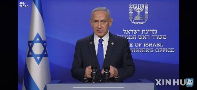 [텔아비브=신화/뉴시스] 베냐민 네타냐후 이스라엘 총리가 13일(현지 시간) 텔아비브에서 이란 타격에 대해 화상 연설을 하고 있다. 네타냐후 총리는 “현재 진행 중인 '라이징 라이언' 작전의 목표는 이란의 핵 인프라, 탄도미사일 공장, 군사 역량을 타격하는 것”이라며 “이는 필요한 만큼 계속될 것”이라고 밝혔다. 이스라엘 카츠 국방장관은 이스라엘이 이란에 대한 '선제 타격'을 개시했다고 발표했다. 2025.06.13.