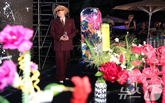 빅뱅 지드래곤(GD,권지용)이 13일 오후 서울 용산구 그랜드 하얏트 서울 호텔에서 열린 '피스마이너스원 프리미엄 하이볼 론칭 파티-더 시그널(THE SIGNAL)'에 참석해 미소를 짓고 있다. ⓒ News1 권현진 기자