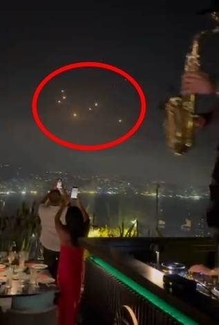 지난 13일 ‘레바논에서’라는 설명과 함께 공개된 영상. 붉은 동그라미는 이스라엘이 발사한 것으로 추정되는 미사일