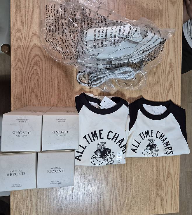 Clothes, toiletries and an iron prepared by Sokkoko Han, a foreign worker at a subcontractor of a major shipyard in Geoje, South Gyeongsang, to send to his wife and two sons back home [JOONGANG ILBO]