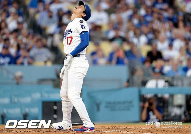[사진] LA 다저스 오타니 쇼헤이가 3회 사구를 당한 뒤 비명 소리를 내고 있다. ⓒGettyimages(무단전재 및 재배포 금지)
