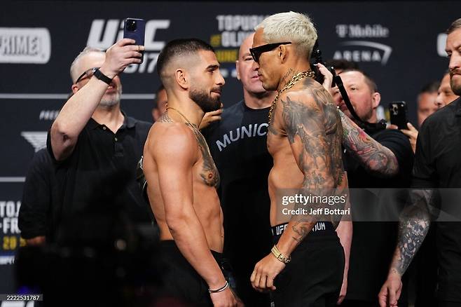 8582488279_486616_b657fa73e4d9fcbd23f6edbe4c02b303.jpg 실시간) UFC 페더급 무패 챔피언 VS 라이트급 전 챔피언 결과