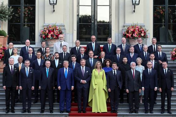 National Security Adviser Wi Sung-lac, back row left, poses for a photo with world leaders including U.S. President Donald Trump ahead of a dinner hosted by Dutch King Willem-Alexander and Dutch Queen Maxima on the sidelines of a NATO Summit at Huis ten Bosch Palace in The Hague, Netherlands, on June 24. [REUTERS/YONHAP]