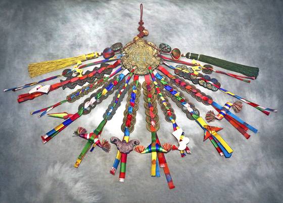 An ihwamun key tag, a popular dowry item in the late Joseon [PARK SANG-MOON]