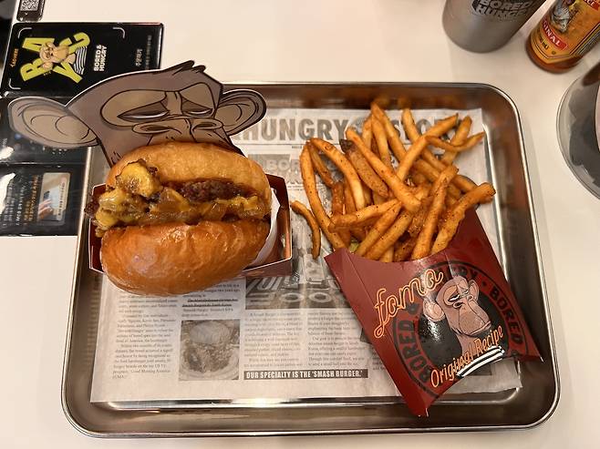A cheeseburger set served at Bored & Hungry in Seoul's Seongsu-dong (Park Jun-hee/The Korea Herald)