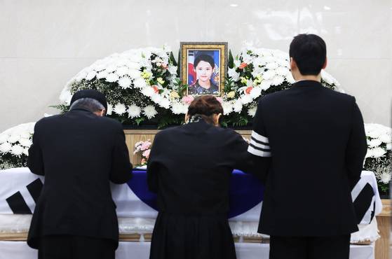 Family members lay flowers during the funeral of late Air Force Master Sgt. Lee Ye-ram at the Armed Forces Capital Hospital in Seongnam, Gyeonggi, on July 20, 2024. [YONHAP]