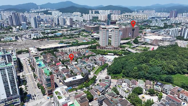 경기도 용인시 기흥구 보정동 카페거리와 인근에 있는 죽전신세계백화점의 모습. 안경찬 PD