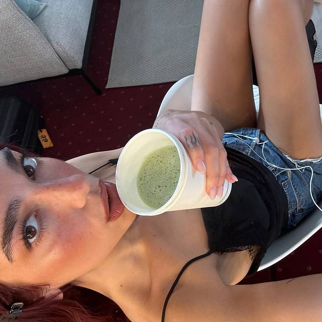 Dua Lipa drinking matcha latte (Instagram)