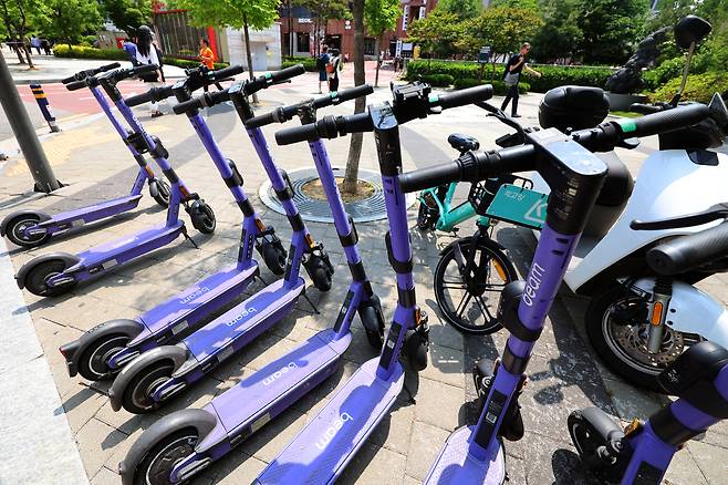 Electric scooters are parked in Mapo District, western Seoul, on May 13 in this photo unrelated to the story. [NEWS1]