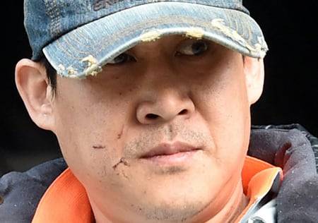 경기도 안산에서 인질 살인 사건을 벌인 김상훈(당시 46)이 2015년 1월 15일 오전 영장실질심사를 받기 위해 경기 안산단원경찰서를 나서고 있다. /뉴시스