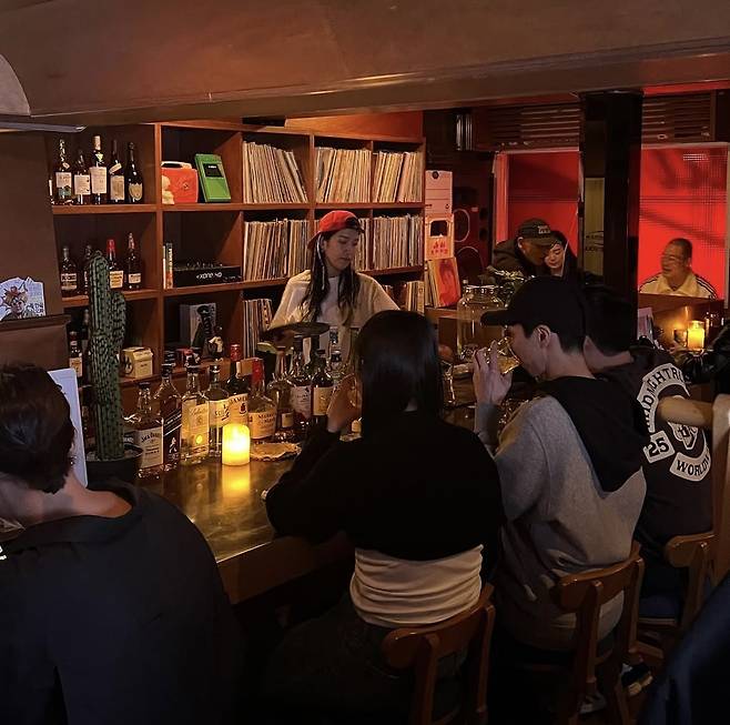 People enjoy drinks and music at CMS, an LP bar in Sindang-dong, Seoul, in this 2023 photo. (CMS' Instagram account)
