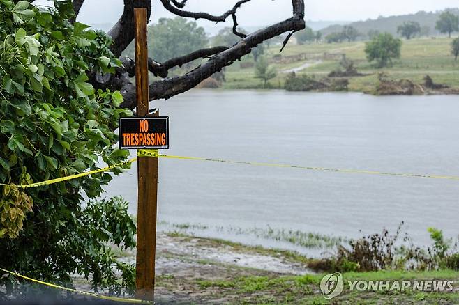 13일 폭우로 다시 수위가 높아진 미 텍사스 과달루페 강   [AFP=연합뉴스. 재판매 및 DB 금지]
