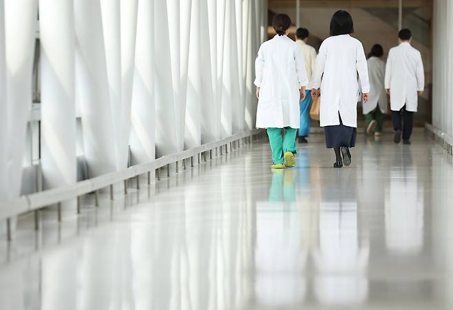 Medical professionals walk inside a general hospital in downtown Seoul on Oct. 28 in 2024 [YONHAP]