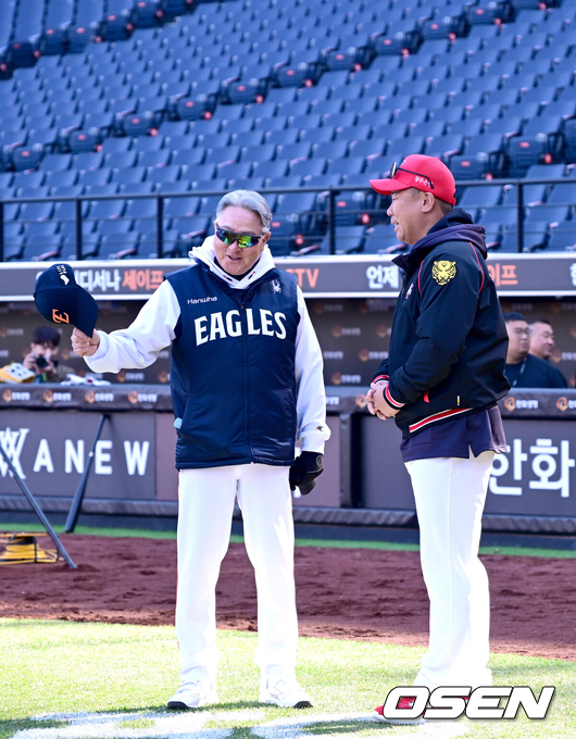 김경문 감독과 이범호 감독./OSEN DB