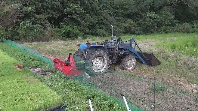 [뉴시스] 백골화된 시신이 발견된 일본 사쓰마센다이시 히와키초 도노하라의 한 논. (사진=MBC남일본방송) 2025.7.19 *재판매 및 DB 금지