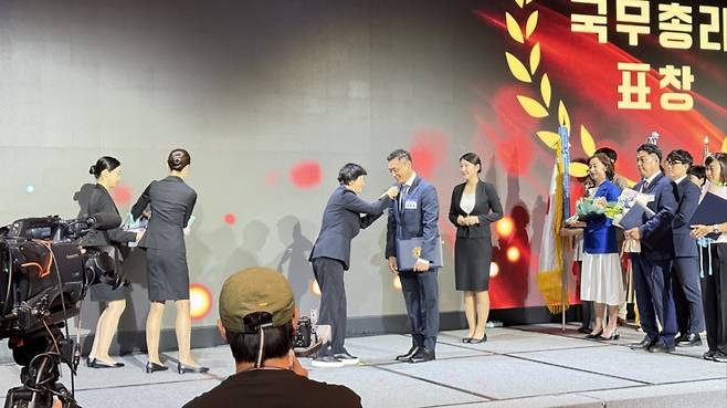 큐라코는 지난 11일 보건복지부가 주최한 '제14회 인구의 날' 기념 행사에서 국무총리 표창을 수상했다./사진=(주)큐라코