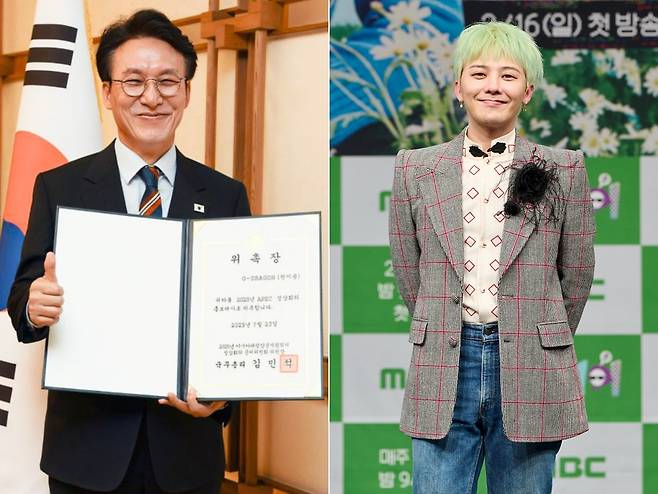 Prime Minister Kim Min-seok, left, holds a certificate of appointment for singer G-Dragon, right, as the honorary ambassador of the 2025 Asia-Pacific Economic Cooperation (APEC) summit set to take place in Korea in October. [SCREEN CAPTURE]