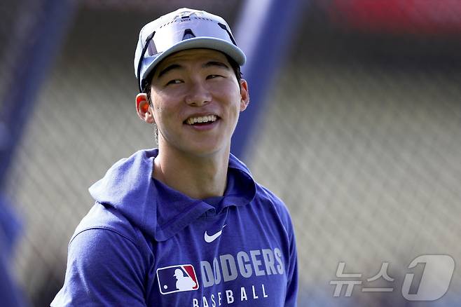 LA 다저스 김혜성은 왼쪽 어깨 상태가 좋지 않다.  ⓒ 로이터=뉴스1