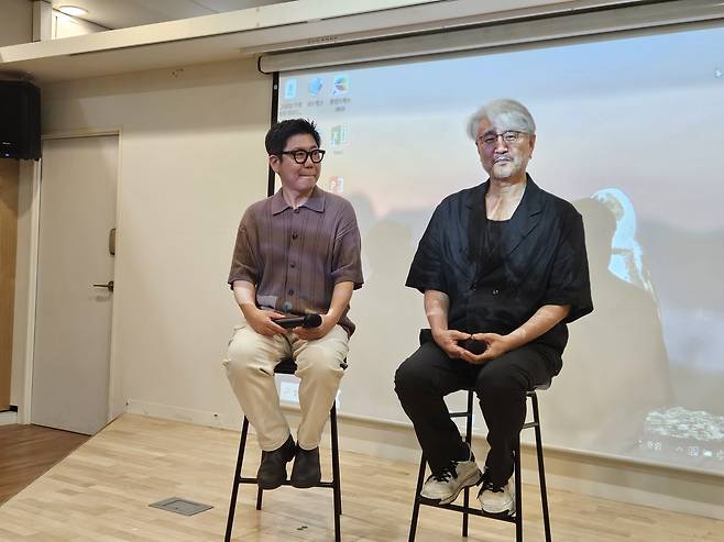 외교부 '꿈꾸는 사진관' 영화 상영회의 정초신(오른쪽) 감독과 작곡가 장태화 씨 [촬영 노재현]