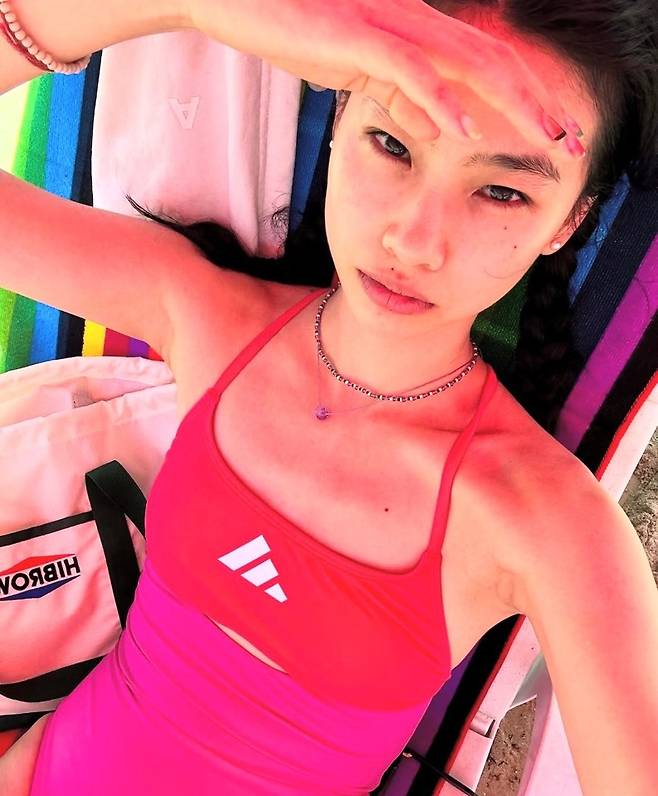 Actor Jung Hoyeon is seen wearing an Adidas swimsuit. (Instagram)