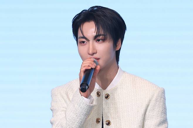 Seonghwa of boy band Ateez speaks during a press conference for the release of the band's 12th EP ″Goldern Hour: Part 3″ at a hotel in Mapo District, western Seoul on June 12. [YONHAP]
