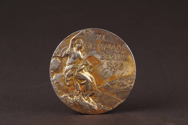 Son Kee-chung's gold medal from the 1936 Berlin Olympics marathon, a nationally registered cultural heritage item [SON KEE-CHUNG MEMORIAL HALL]