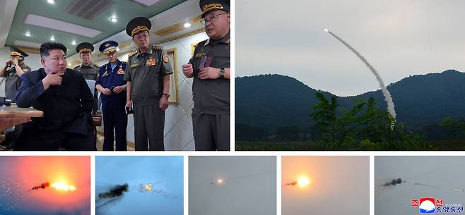 북한 미사일총국은 지난 23일 김정은 국무위원장이 참관한 가운데 성능을 개량한 두 종류의 신형 지대공(반항공) 미사일의 전투적 성능검열을 위하여 각이한 목표들에 대한 사격을 진행했다고 밝혔다. /연합뉴스