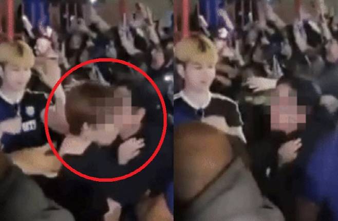 K팝 그룹 유나이트의 멤버 은호에게 스킨십을 시도하는 브라질 여성의 모습. (사진=엑스 캡처)