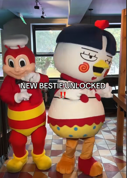 졸리비 마스코트(왼쪽)와 삼양식품 불닭 마스코트 ‘호치’가 함께 춤을 추고 있다. [졸리비 UK 인스타그램 캡처]