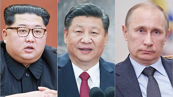 왼쪽부터 김정은 북한 국무위원장, 시진핑(習近平) 중국 국가주석, 블라디미르 푸틴 러시아 대통령. 중앙포토