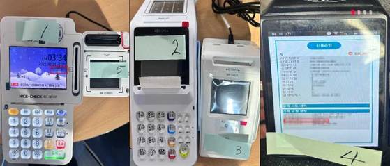 서울경찰청 광역수사단 국제범죄수사1계가 스미싱 신용카드 사기단에게서 허위 결제에 사용된 카드 단말기를 압수했다. 사진 서울경찰청