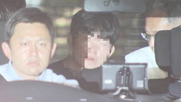 박 씨가 차량을 타고 연행되고 있다. 사진은 해당 피의자. [사진=니혼테레비]