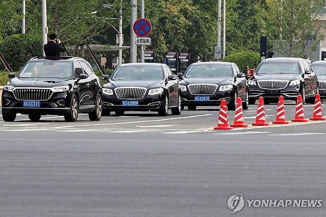 김정은 탑승 추정 차량 행렬 [로이터 연합뉴스 자료사진. 재배포 및 판매 금지]