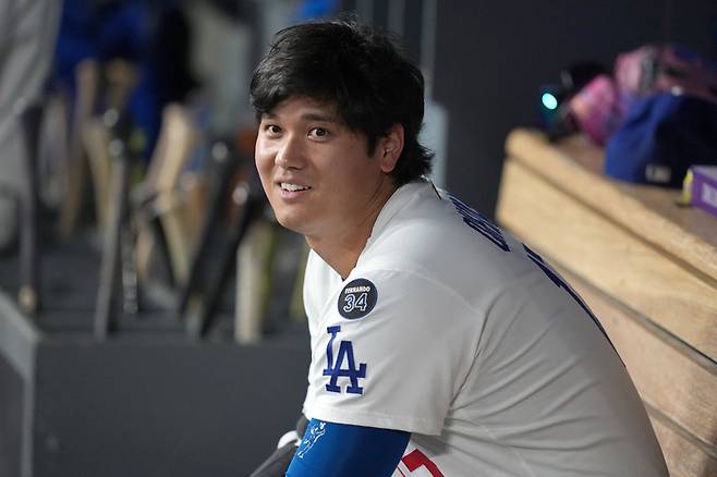 LA 다저스 오타니 쇼헤이가 지난 8월30일(한국 시간) 미국 캘리포니아주 LA 다저 스타디움에서 열린 2025 메이저리그 정규시즌 애리조나전에 앞서 더그아웃에 앉아 있다. 사진 | LA=Imagn Images 연합뉴스