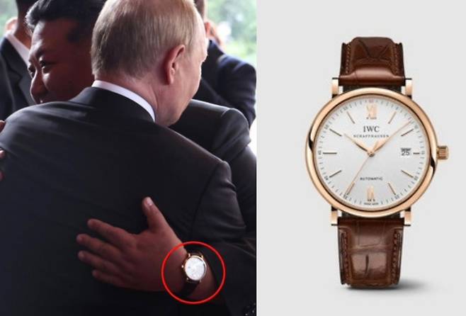 김정은 북한 국무위원장이 블라디미르 푸틴 러시아 대통령을 포옹하며 보인 ‘IWC 샤프하우젠 포르토피노 오토매틱’ 시계 [조선중앙통신, IWC]