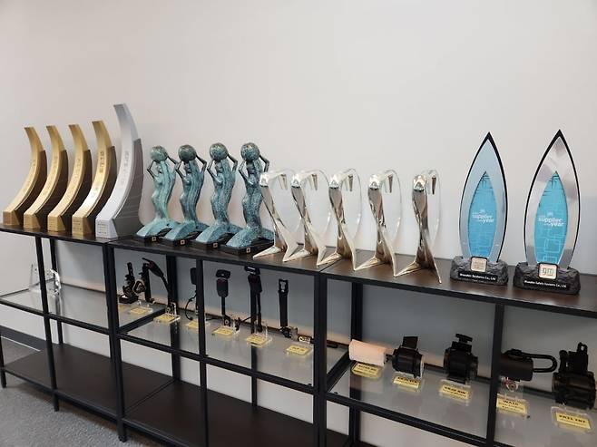 GM '올해의 우수협력사' 상을 20회 이상 받은 우신시스템. 우신시스템 제공