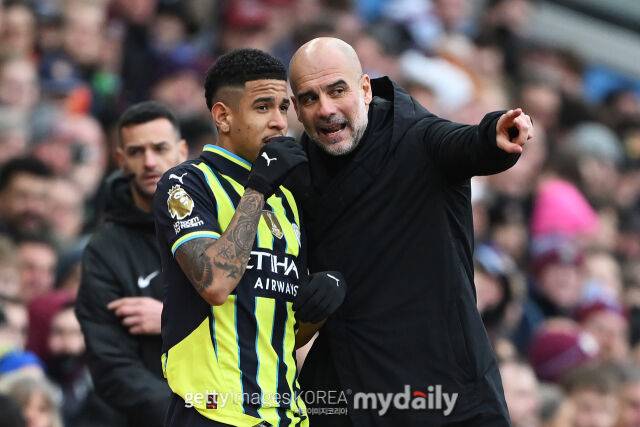 사비뉴와 과르디올라 감독/게티이미지코리아