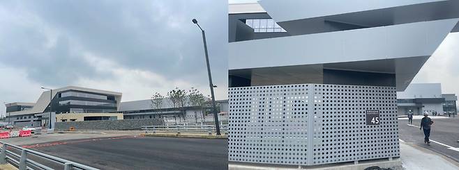 브레인시티 산업시설용지 8 구역에 조성되고 있는 건물 전경(왼쪽). 건물 입구에는 ‘브레인산단4로 45’라는 도로명 주소가 표기돼 있다.(오른쪽). 이 건물에는 이달 이차전지 기업 탑머티리얼이 입주할 예정이다. / 사진 = 정해용 기자