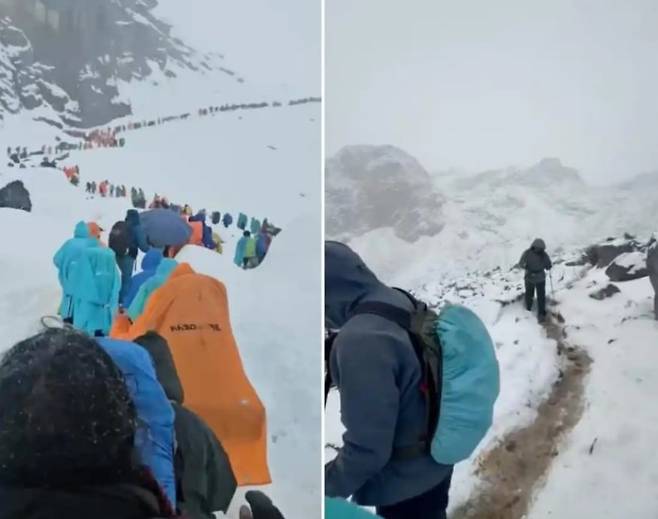 에베레스트산에 고립됐다가 대피하는 등산객들. /홍성신문