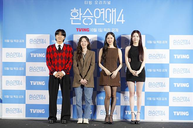 The producer and panel members of love matching TV series ″EXchange″ (2021-) pose for photos during a press conference for the franchise's fourth season in Yongsan District, central Seoul, on Oct. 1. From left are comedian Lee Yong-jin, producer Kim In-ha, actor Kim Ye-won and Yura of Girl's Day. [TVING]