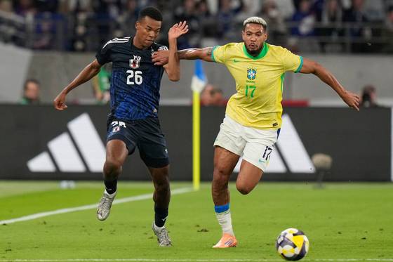 일본 축구가 브라질을 상대로 대역전승을 거뒀다. AP=연합뉴스