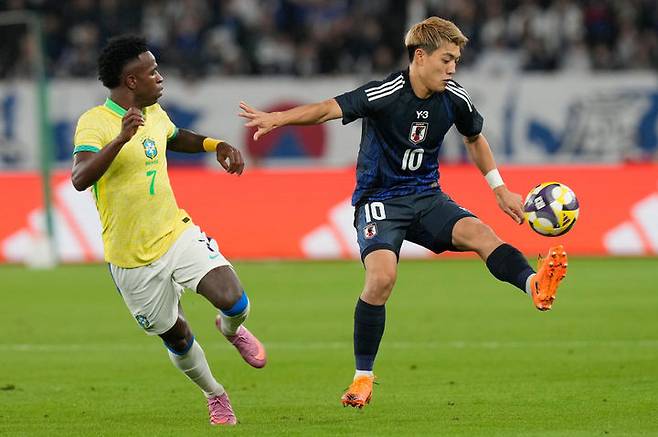 [도쿄=AP/뉴시스]브라질과 평가전 치르는 일본. 2025.10.14.