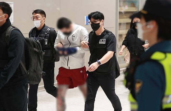 캄보디아에서 구금됐다 한국으로 송환된 한국인들 [사진출처=연합뉴스]