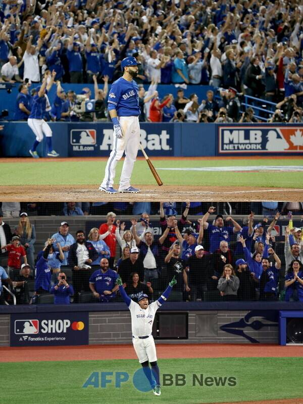 2015년 호세 바티스타(상단)처럼 기적의 3점포로 토론토의 승리를 이끈 조지 스프링어. ⓒAFPBBNews = News1