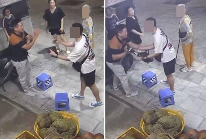 한국인 관광객이 어머니를 찾아 준 과일가게 주인 퍼엉씨에게 감사 인사를 표하고 있다. /Z뉴스