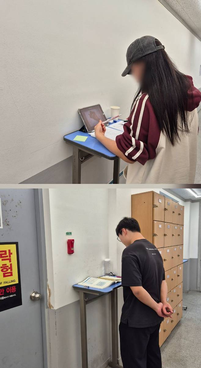 '스탠딩 책상'에서 졸음을 쫓으며 공부하는 학생들. 사진=김예지 기자