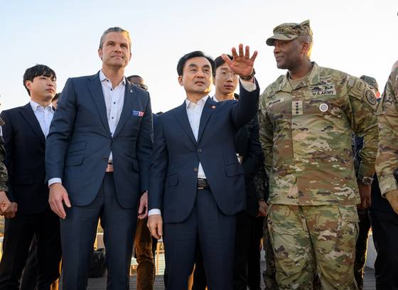 U.S. Defense Secretary Pete Hegseth, second from left, and Korean Defense Minister Ahn Gyu-back, center, visit the Observation Post Ouellette near the border village of Panmunjom on Nov. 3. [MINISTRY OF NATIONAL DEFENSE]
