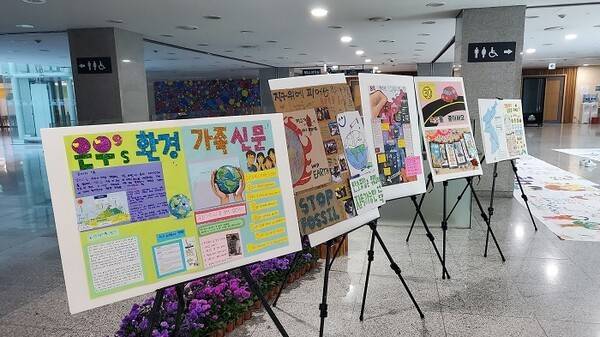 Award-winning works are displayed during the “2025 World Diary of Love Festival” awards ceremony held at the National Assembly Members’ Office Building in Yeouido, western Seoul, on Oct. 25. [HUMAN RECOVERY MOVEMENT ASSOCIATION]